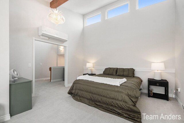 bedroom featuring a towering ceiling, light colored carpet, a wall unit AC, a notable chandelier, and beamed ceiling