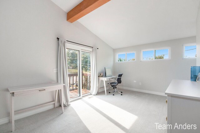 carpeted home office with lofted ceiling with beams