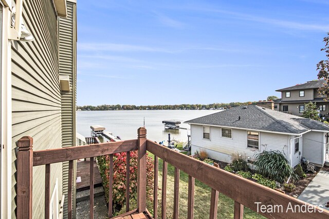 balcony featuring a water view