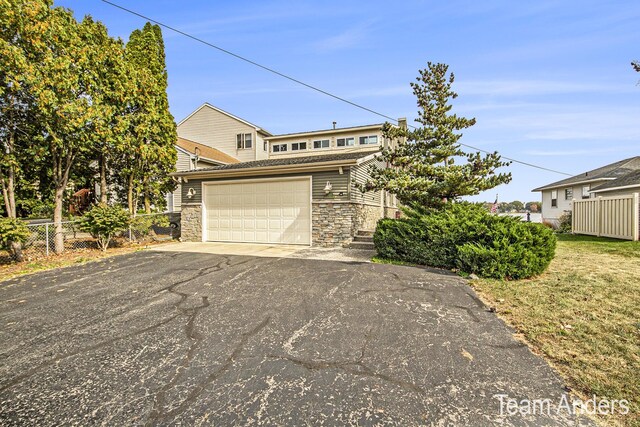 view of front of house with a garage