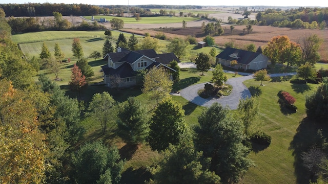 birds eye view of property featuring a rural view