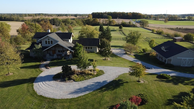 birds eye view of property featuring a rural view