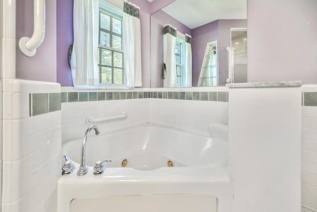 bathroom featuring a tub