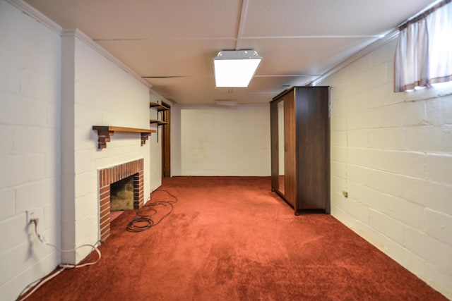 basement with carpet floors and a fireplace