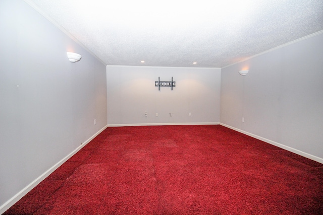 carpeted empty room with recessed lighting, crown molding, a textured ceiling, and baseboards