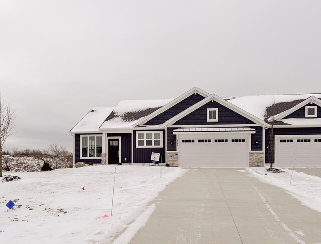 view of front of property featuring a garage