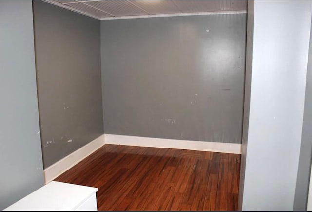 spare room featuring hardwood / wood-style floors