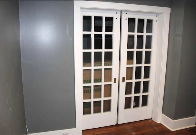 room details featuring wood-type flooring and french doors