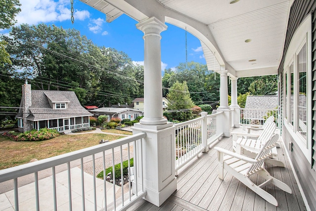 wooden deck featuring a porch