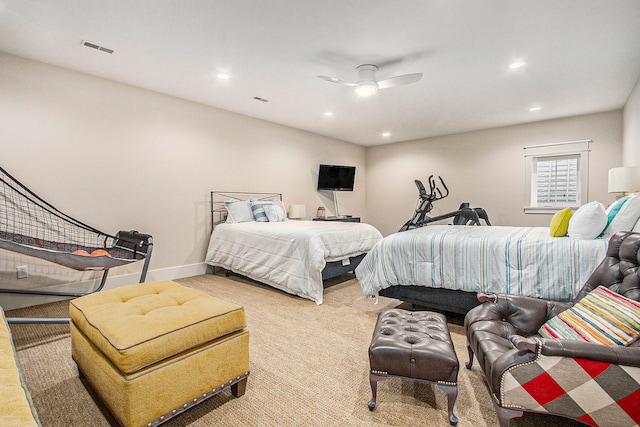 bedroom with ceiling fan and carpet flooring