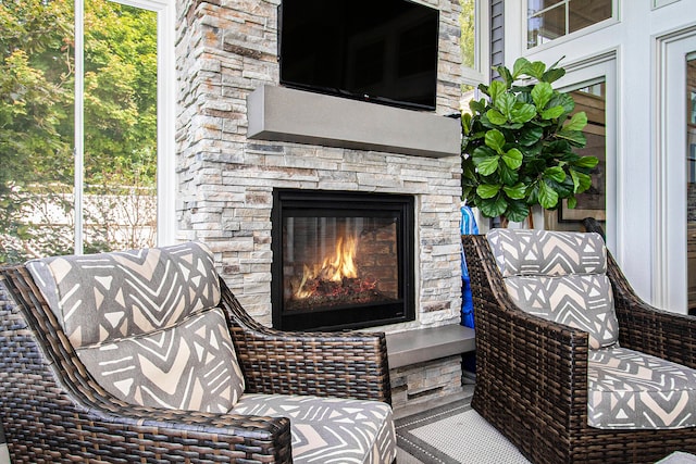 view of patio / terrace featuring a fireplace