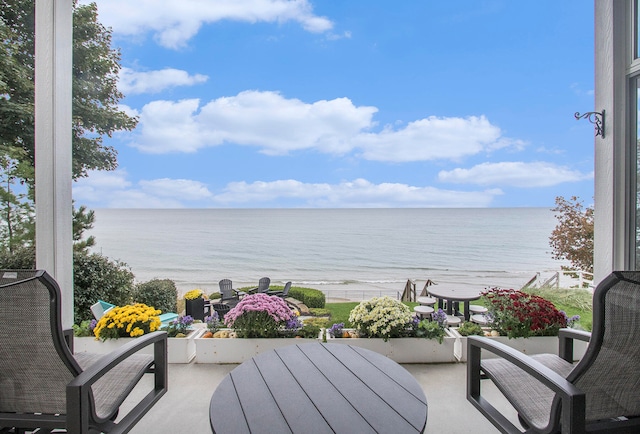 balcony featuring a water view