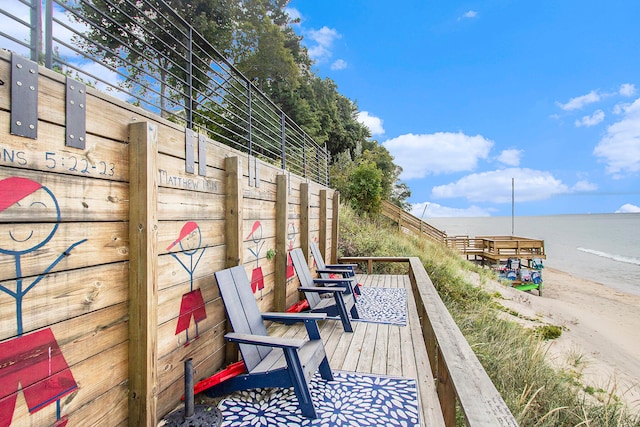 deck featuring a water view