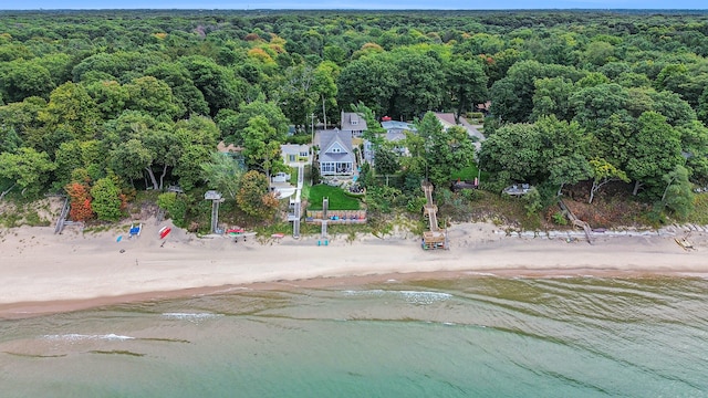 bird's eye view featuring a view of the beach and a water view