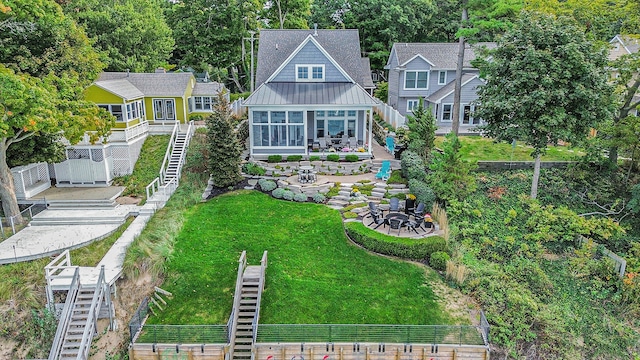 exterior space with a fire pit, a yard, and a patio