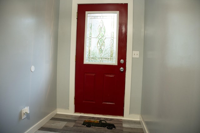 entrance foyer with dark hardwood / wood-style flooring