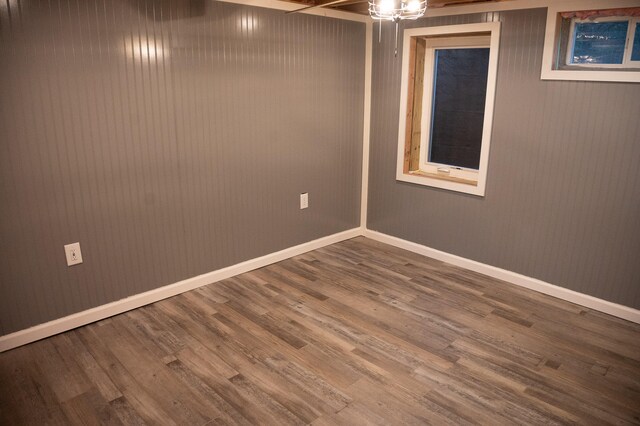 basement featuring hardwood / wood-style flooring