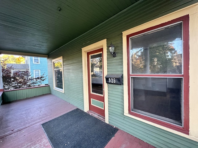 entrance to property with a wooden deck