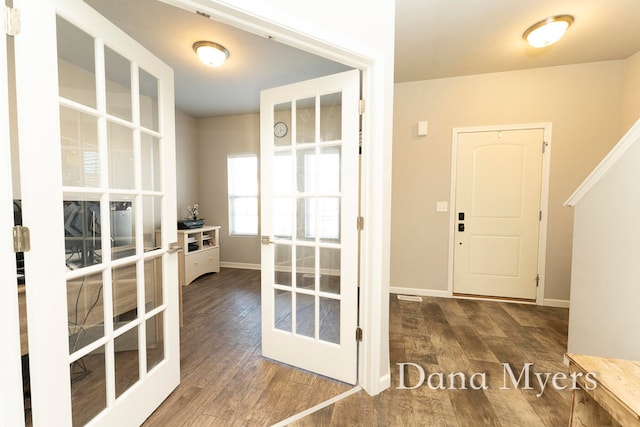 doorway to outside with french doors and hardwood / wood-style floors