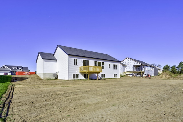 back of property featuring cooling unit