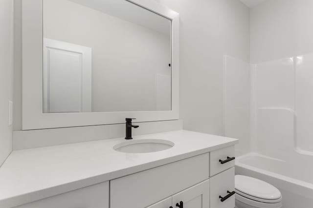 full bathroom with shower / washtub combination, vanity, and toilet