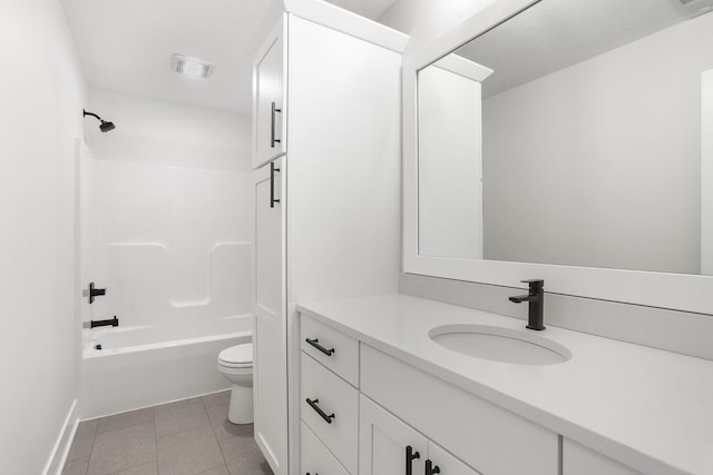 9530 Shoreway Dr, West Olive, MI 49460 - bathroom with toilet, vanity, tile patterned floors, washtub / shower combination, and baseboards