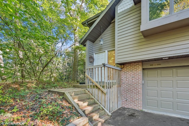 view of side of property with a garage