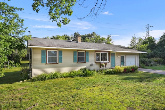 ranch-style home with a garage and a front yard