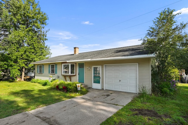 single story home featuring a front lawn and a garage