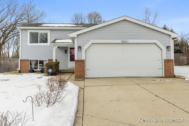 view of front of property featuring a garage