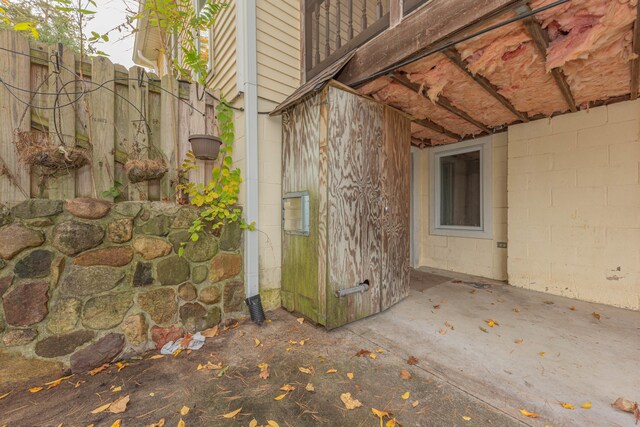 view of side of home featuring a patio