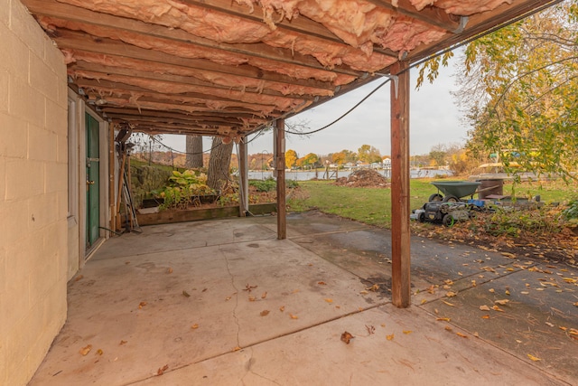 view of patio / terrace with a water view