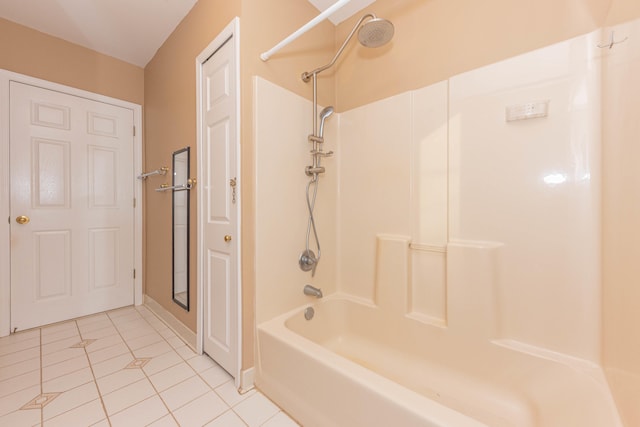 bathroom with shower / tub combination and tile patterned flooring