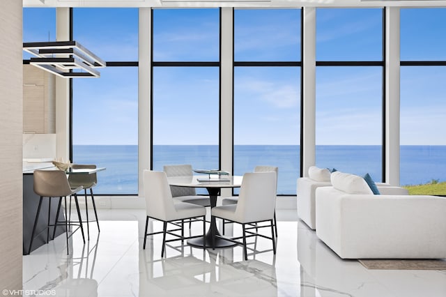 dining room with a water view