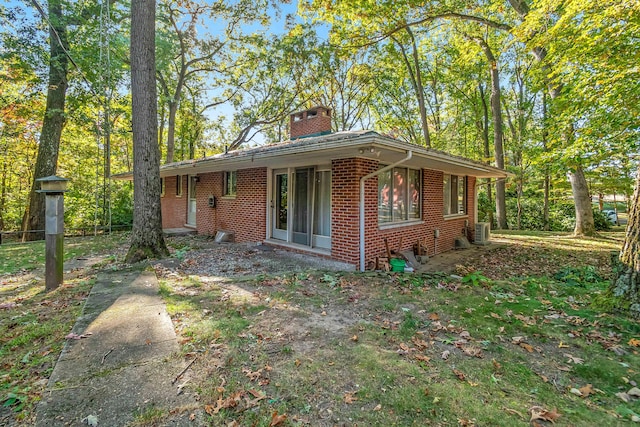 view of front of home featuring cooling unit