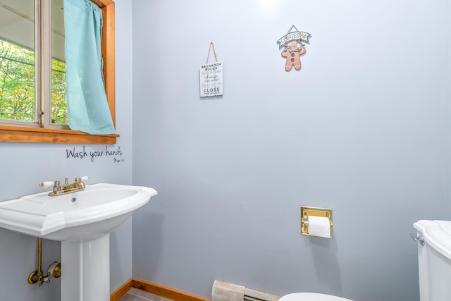 bathroom with sink and toilet