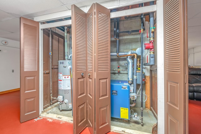 utility room with gas water heater