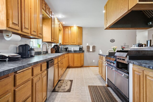 kitchen featuring extractor fan, light tile patterned floors, sink, and stainless steel appliances