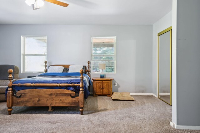 bedroom featuring carpet floors, a closet, and ceiling fan