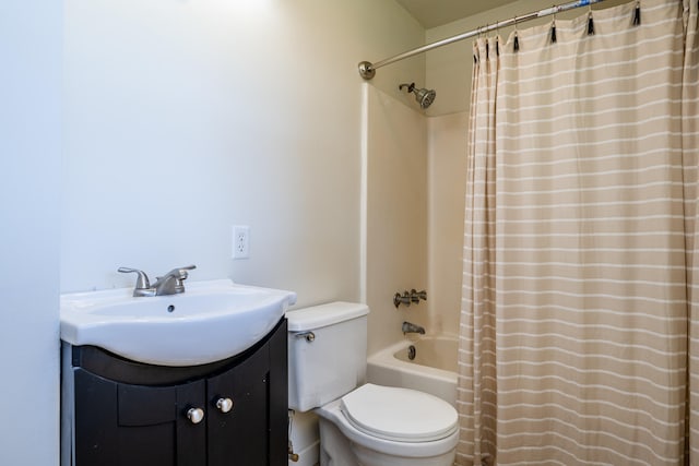 full bathroom with vanity, toilet, and shower / bath combo