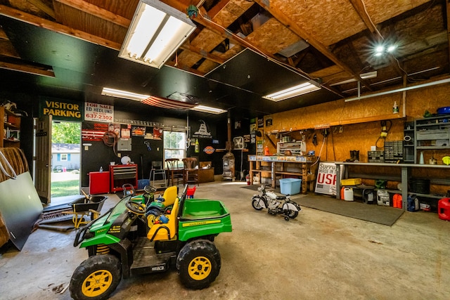 garage with a workshop area