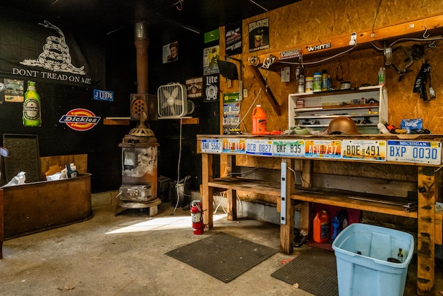 interior space featuring a workshop area and concrete floors