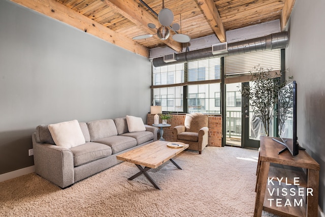 carpeted living room featuring ceiling fan, wood ceiling, and beam ceiling