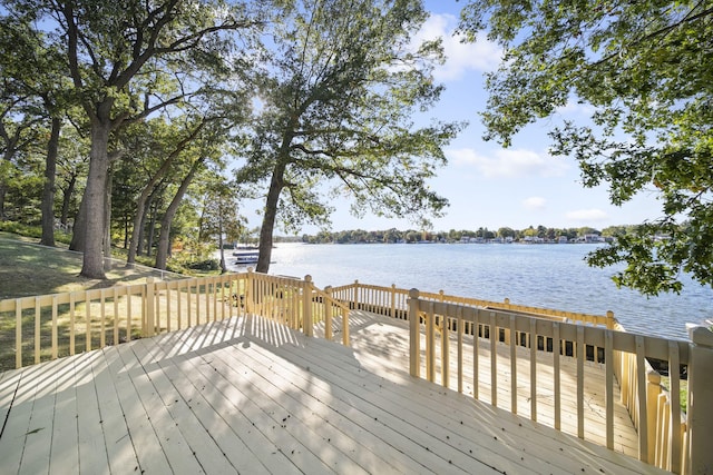 deck featuring a water view