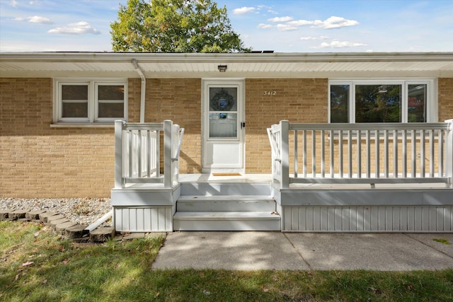 doorway to property with a porch