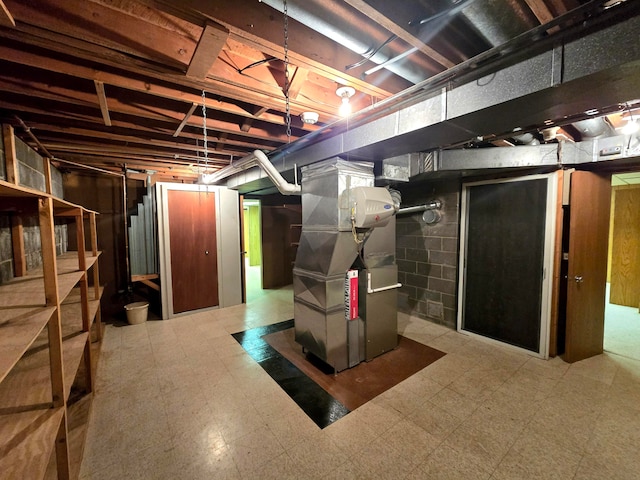 basement featuring heating unit