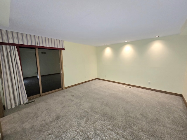 view of carpeted spare room