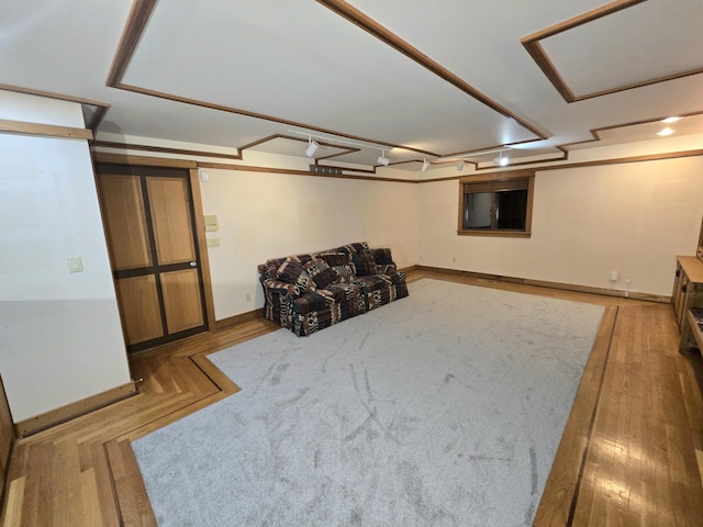 basement featuring light wood-type flooring