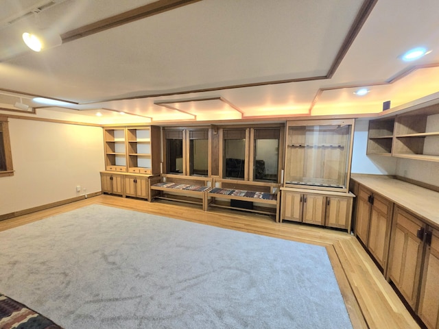 unfurnished living room featuring light wood-type flooring