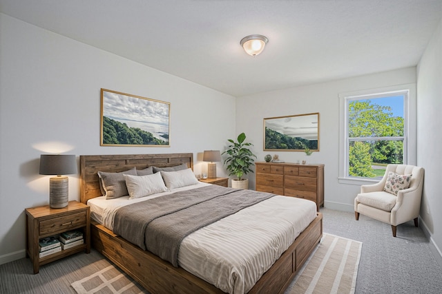 bedroom featuring light colored carpet